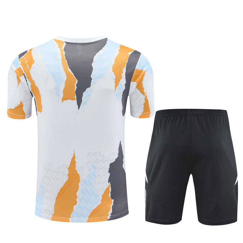 Ensemble d'entrainement real madrid orange et blanc 2024/25